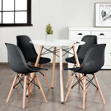 Costway Canada Ensemble de 4 chaises modernes en plastique ajouré avec pieds en bois chez Costway Canada