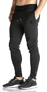 New Balance BROKIG Men's Zip Joggers Casual Gym Workout Track Pants | Slim Tapered Fit Breathable Stretch Athletic Track Pants for... chez Amazon US